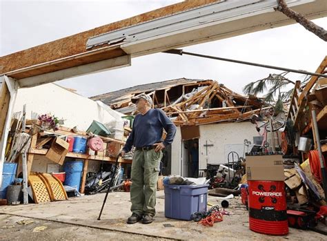 Photo Man Stands In Garage Of His Destroyed Home In Georgia After Tornado Hits