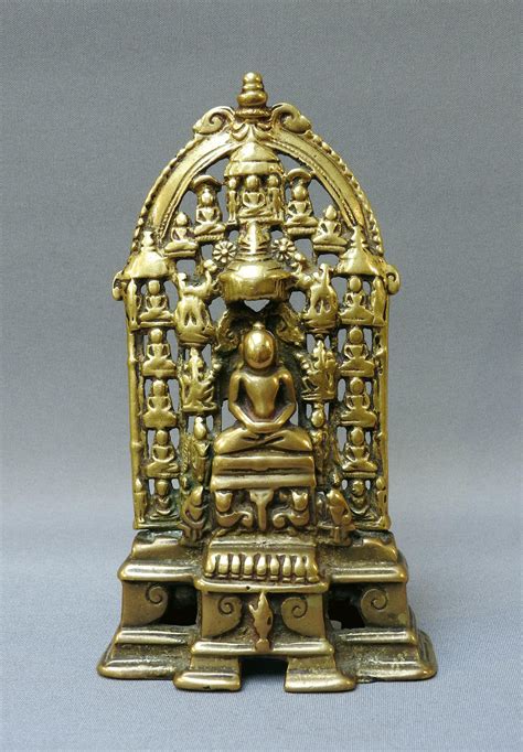 seated Tirthankara – Astamangala