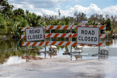 Road Closed For Roadworks And Danger Of Flooding With Warning Signs ...