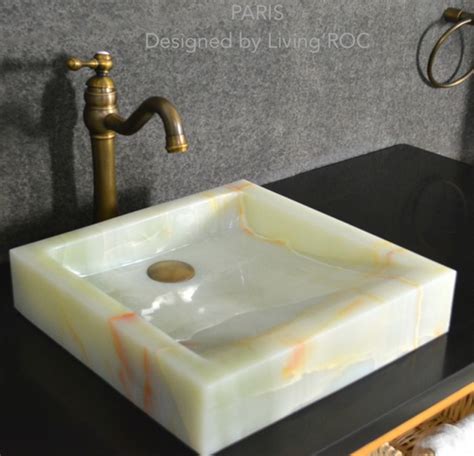 LivingRoc USA-The Blog: Black Granite bathroom sinks....