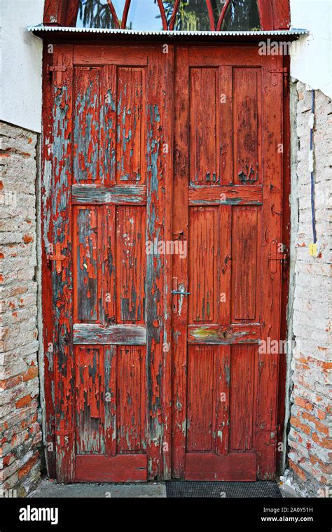 Old Damaged Wooden Door Architectural Background For Your Design Stock