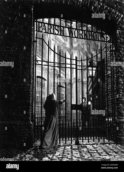 JOSEPHINE STUART as Oliver's young mother at Parish Workhouse Gate in OLIVER TWIST 1948 director ...