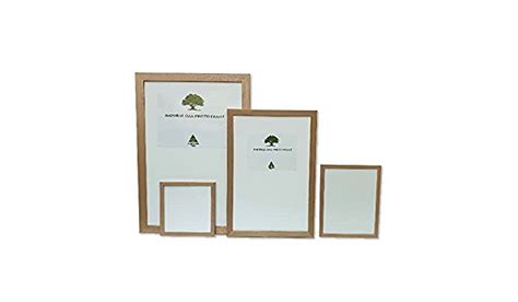 Three Pieces Of Wood And White Paper With Trees On Them