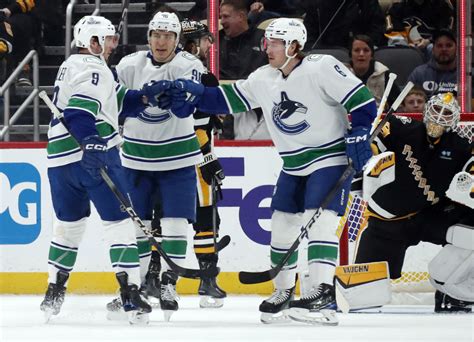 Elias Pettersson Shines As The Canucks Defeat The Penguins In Overtime - The Hockey News ...