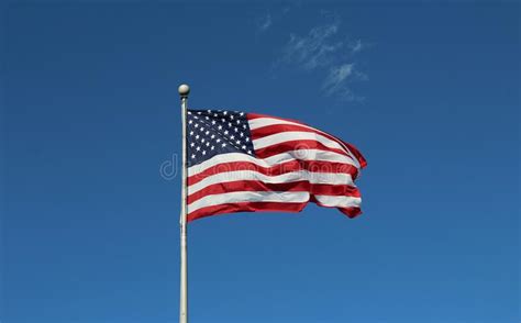 The American Flag Waving High In The Sky Stock Photo Image Of Winter