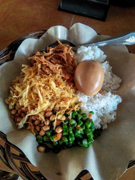 Nasi Balap Puyung Inaq Esun Santapan Legendaris Tanah Lombok Bikin Ngiler