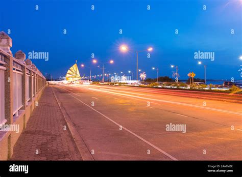 The Light Trails On The Modern Building Background In New Bridge