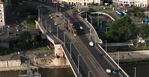 Modern Tram Unit Approaching Tram Stop in Centre of Multilane ...