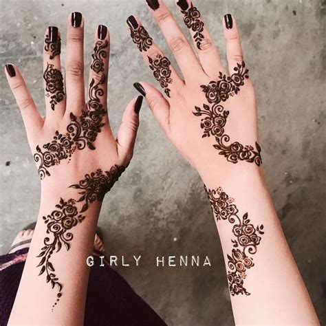 Two Hands With Henna Designs On Them And The Words Girly Henna Written