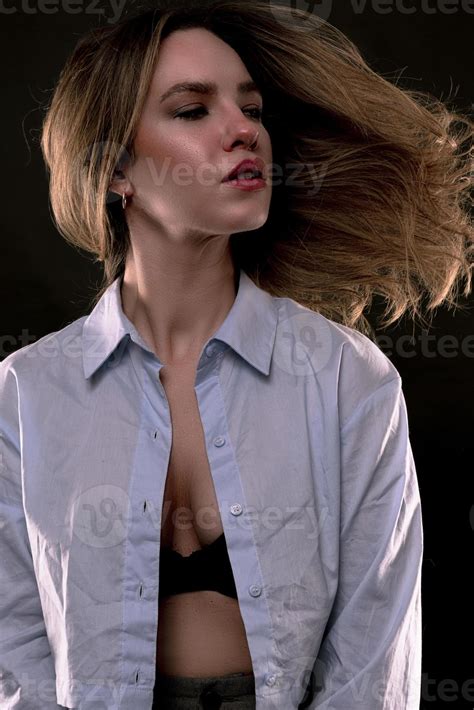 Beautiful American Woman Posing On Black Background Wearing Black Leather Jacket Fashion Model