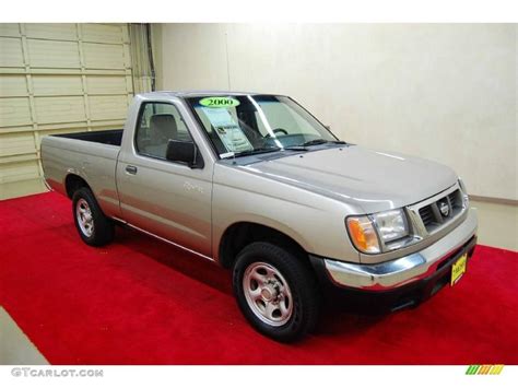 Sleek Silver Nissan Frontier XE Regular Cab