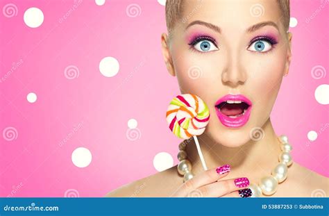 Funny Girl Eating Lollipop Stock Photo - Image: 53887253