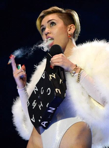 Miley Cyrus Smokes Joint As Her Wrecking Ball Wins Best Video At Mtv Emas