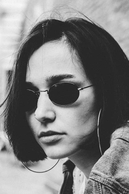 Premium Photo Close Up Of Woman Wearing Sunglasses