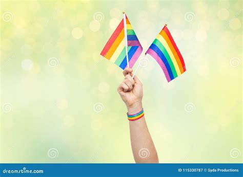 Hand With Gay Pride Rainbow Flags And Wristband Stock Image Image Of