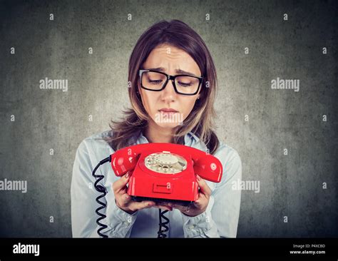 Sad Desperate Business Woman Waiting For A Telephone Call Stock Photo