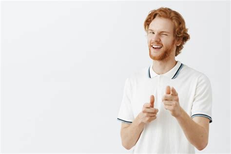 Free Photo Attractive Bearded Redhead Guy Posing Against The White Wall