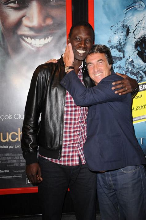 Photo Omar Sy et François Cluzet lors de la présentation du film