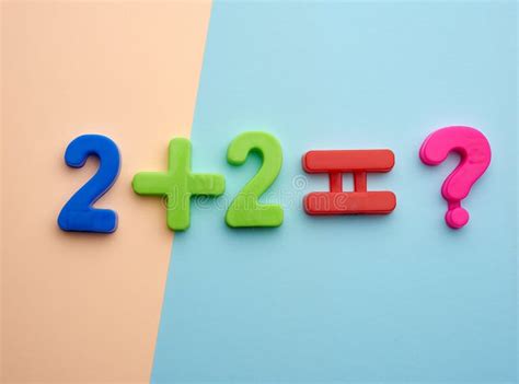 Example Two Plus Two Equals Four On A Black Background Stock Image