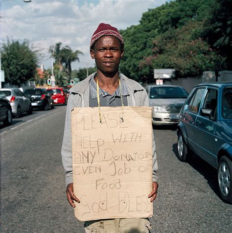 Begging Signs - Gideon Mendel