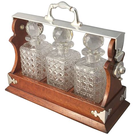 English Tantalus Or Decanter Set For Spirits Of Oak And Silver At 1stdibs