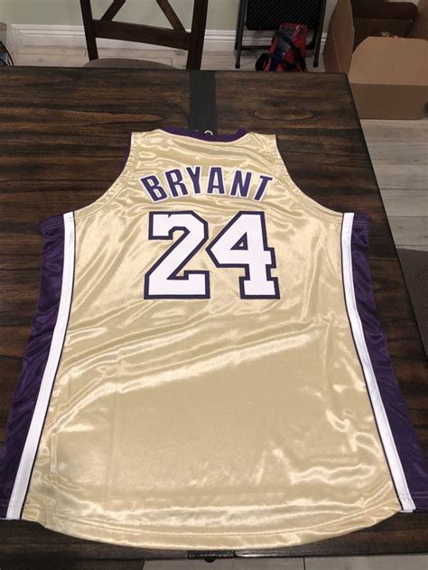 Mens Los Angeles Lakers Kobe Bryant Mitchell And Ness Gold Hall Of Fame