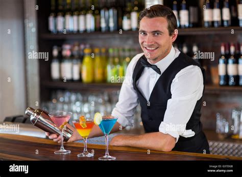 Bartender Mixing A Cocktail Drink In Cocktail Shaker Stock Photo Alamy