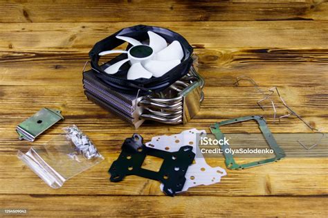 Modern Cpu Cooler With Installation Kit On A Wooden Desk Stock Photo ...