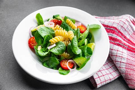 Premium Photo Fresh Salad Pasta Tomato Cucumber Green Leaf Mix