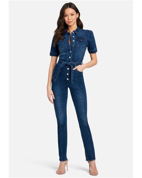 Bebe Button Front Slim Leg Denim Jumpsuit In Blue Lyst