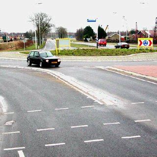 Typical Dutch design for a turbo-roundabout ( 22 ). | Download ...