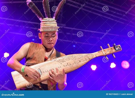 Sarawak Traditional Music Instrument An Iban Playing The Traditional