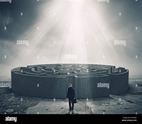 Businessman Standing Near The Enter Of Labyrinth Stock Photo Alamy