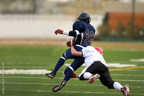 Football Tackle Stock Photo | Adobe Stock