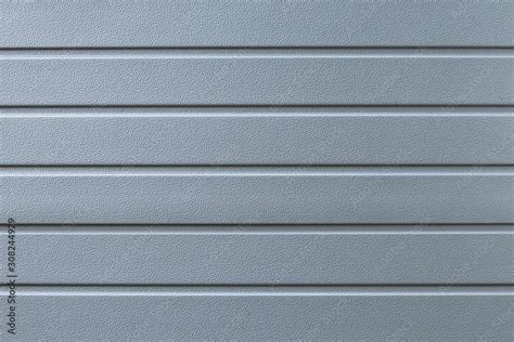 Striped Gray Metal Surface Texture Of Grey Ribbed Metallic Cladding