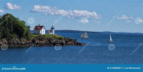 Cutler Island Lighthouse with Sailboats Floating by. Maine Coast Camden ...