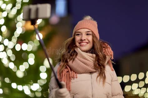 Young Woman Taking Selfie Over Christmas Tree Stock Image Image Of