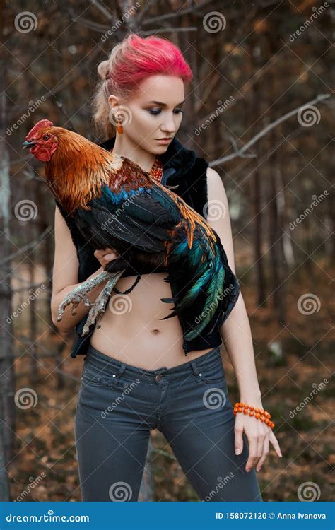 Woman Holding A Rooster In Her Hands Red Makeup On Girl Face Creative