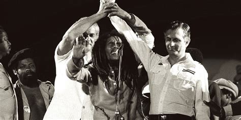 Bob Marley joining hands of political rivals Michael Manley and Edward Seaga during the ...