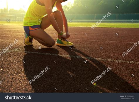 Young Fitness Woman Runner Tying Shoelace Stock Photo Edit Now 579823099