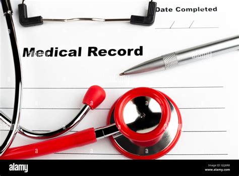 Red Stethoscope On Blue Clipboard With Medical Record Close Up With