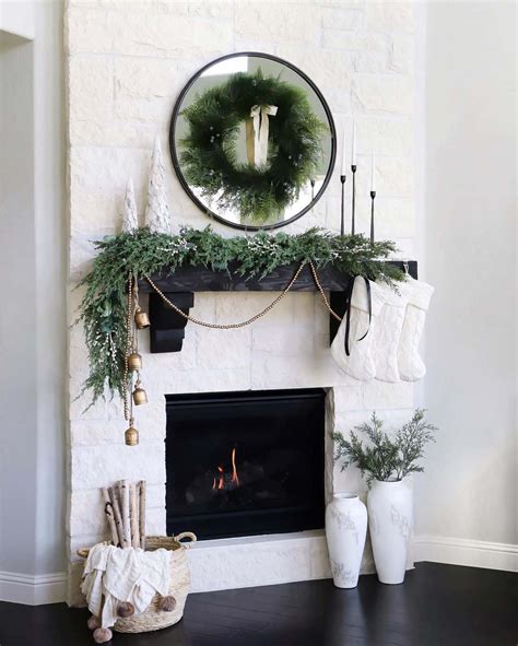 Black Fireplace Mantle With Green Garland Soul Lane