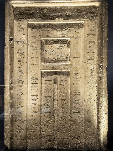 Ancient Egyptian Stone Tablet with Engraved Figures and Hieroglyphics ...