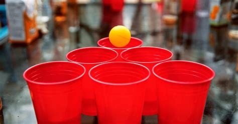 How To Play Beer Pong Rules Tips And Tricks Drinkinggametime