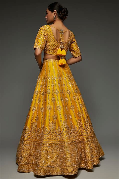 Mustard Raw Silk Embellished Wedding Lehenga Set By Kalighata At Pernia