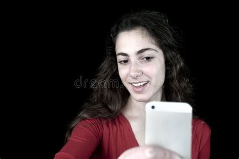 Young Female Holding a Smartphone Stock Photo - Image of selfie, head ...