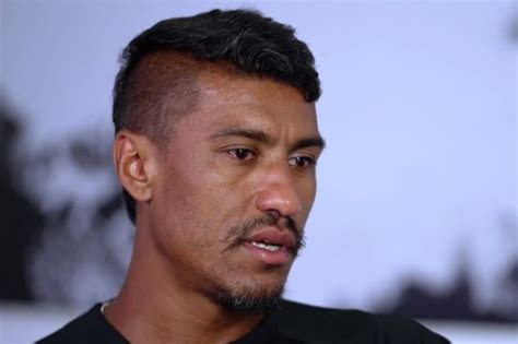 Former Tottenham star Paulinho fights back tears in emotional interview ...