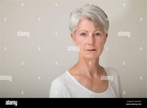 Attractive senior lady with grey hair Stock Photo - Alamy