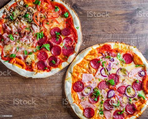 Pepperoni Pizza And Pizza Four Seasons With Mozzarella Cheese Ham