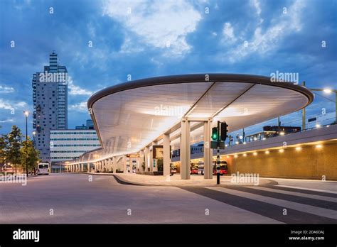 Illuminated new busstion at night. The new Tilburg bus station has a ...